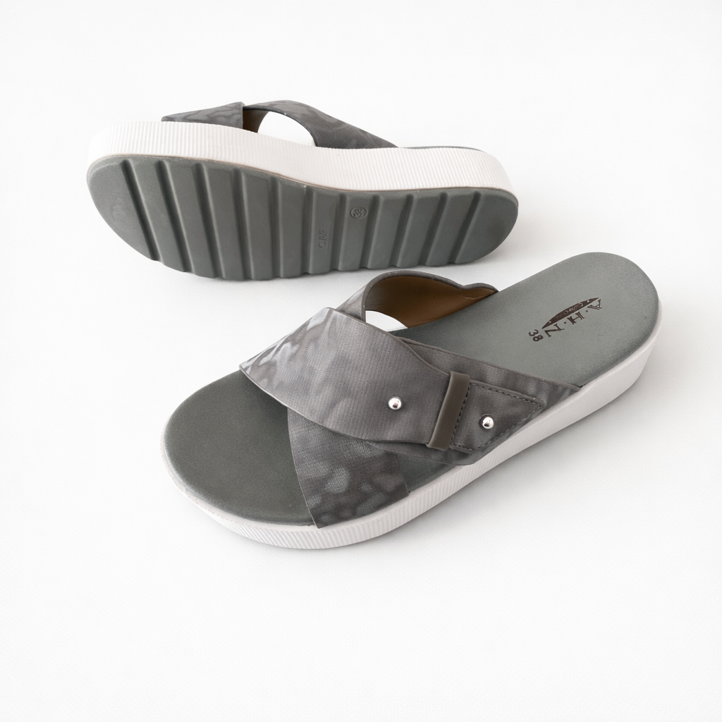 Gray sandals with a white sole on a white background